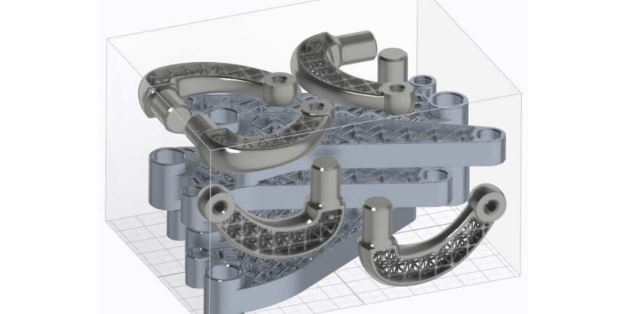 Multiple parts arranged in a print tray assembly for optimized additive manufacturing.